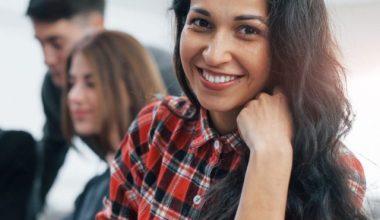 cheerful-brunette-group-young-people-casual-clothes-working-modern-office-1-1